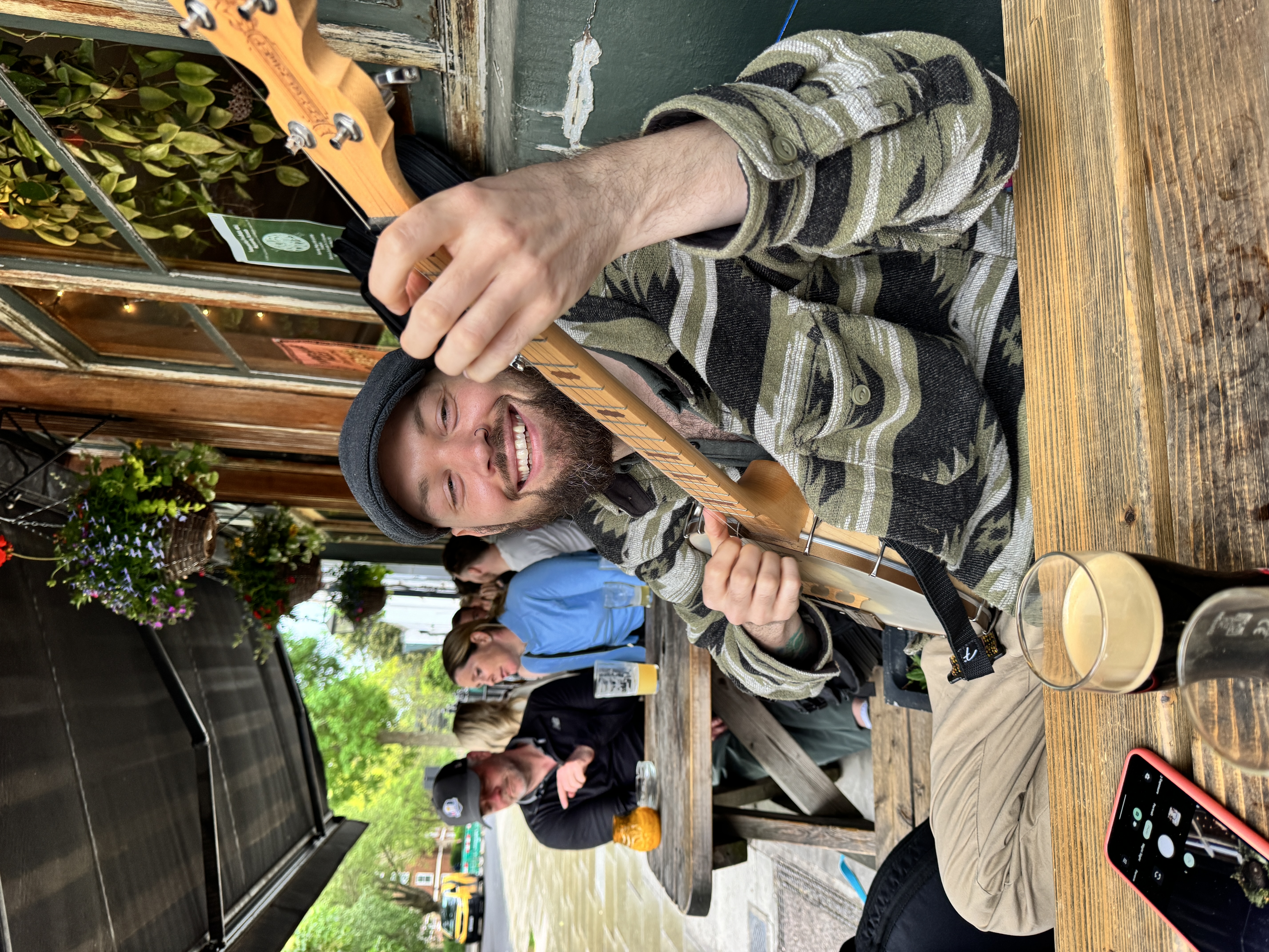 Hokum Jukebox banjo player at a pub gig
